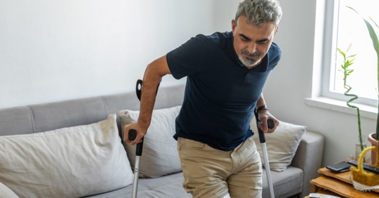 Man with crutches after a personal injury accident